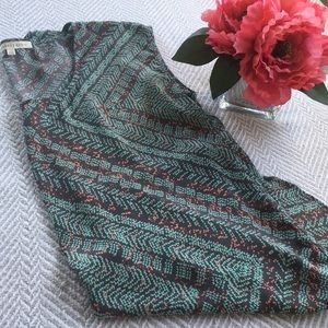 Very pretty sleeveless blouse